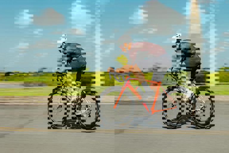 Triathlete Sets Record Pace During Coastal Ironman While Battling Harsh Winds